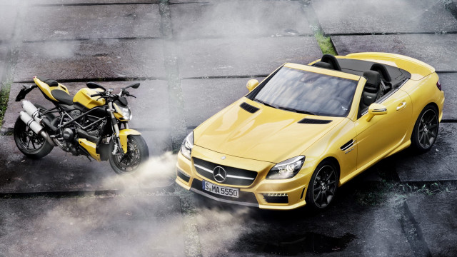 Yellow car motorcycle smoke tiltshift free wallpaper - medium preview image