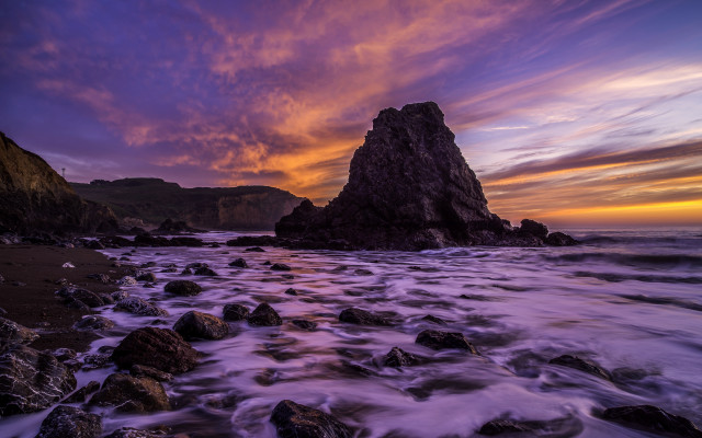 Rocky beach sunset mountain clouds free wallpaper - medium preview image