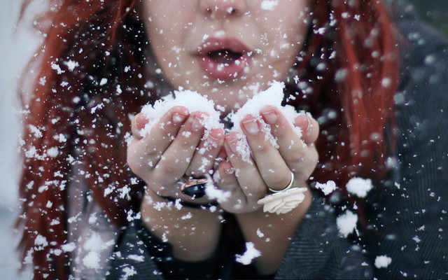Woman snow blowing starry night free wallpaper - medium preview image