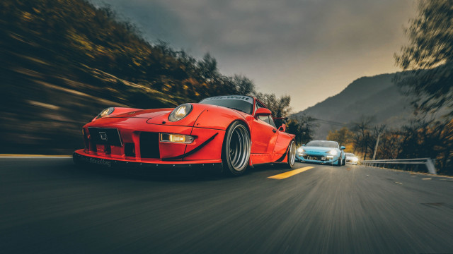 Red sports car blue sports free wallpaper for desktop - medium preview image