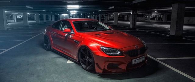 Red car parking garage photorealism free wallpaper - medium preview image