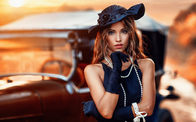 Woman blackdress hat pearls suitcase free wallpaper - medium preview image