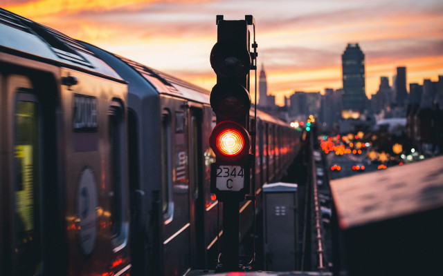 Train city sunset skyline blurry free wallpaper - medium preview image