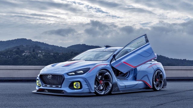 Blue car road mountains clouds free wallpaper - medium preview image