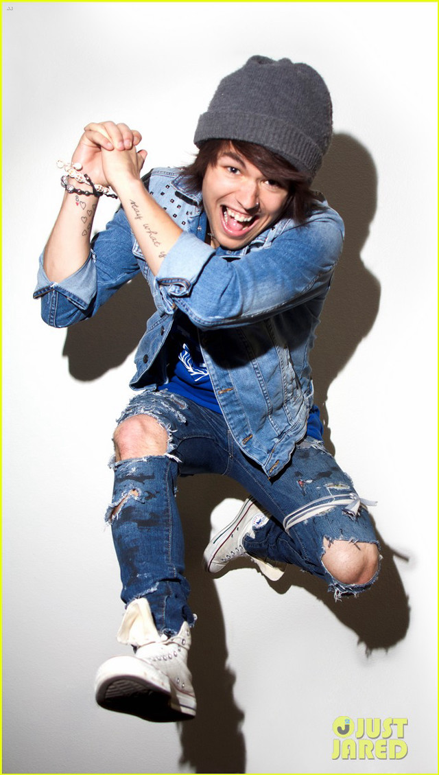 Man denim jacket jumping arms free wallpaper - medium preview image
