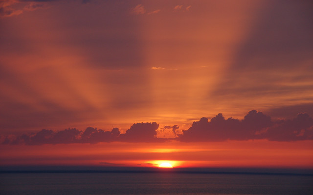 Sunset clouds plane water sky free wallpaper - medium preview image