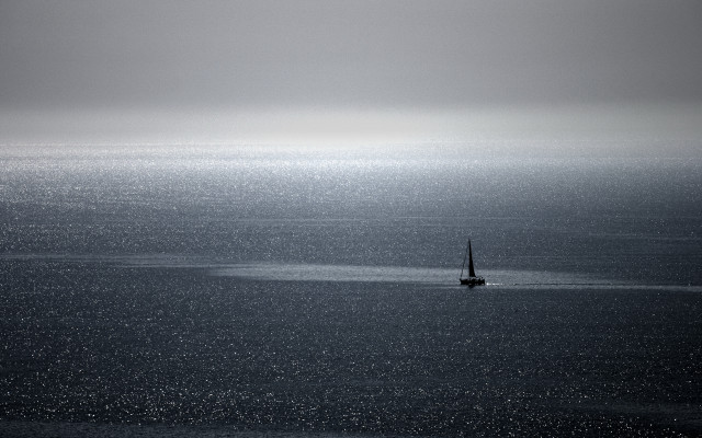 Sailboat foggy ocean minimalist tranquil free wallpaper - medium preview image