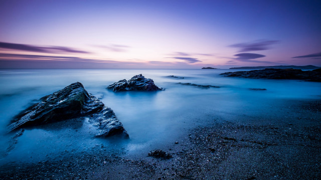 Purple sky beach rocks long free wallpaper - medium preview image