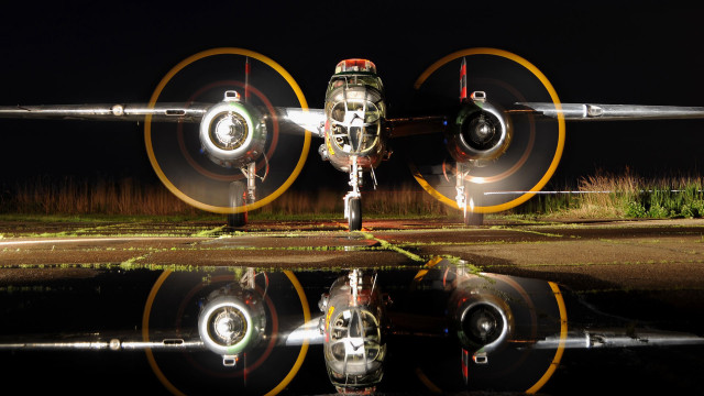 Plane runway night lights reflection free wallpaper - medium preview image