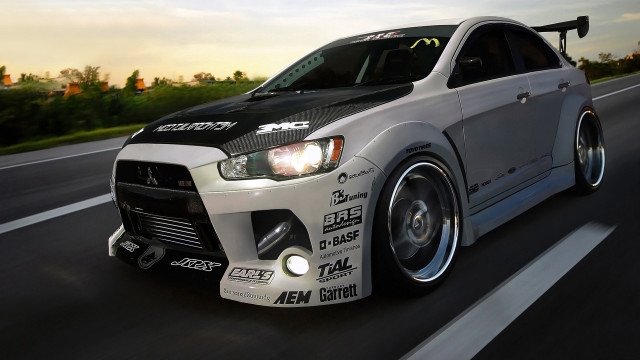 White car driving road sky free wallpaper - medium preview image