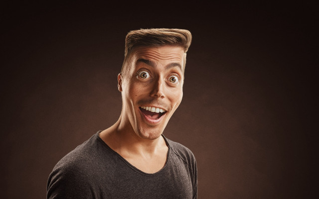 Man surprised funny face black free wallpaper - medium preview image