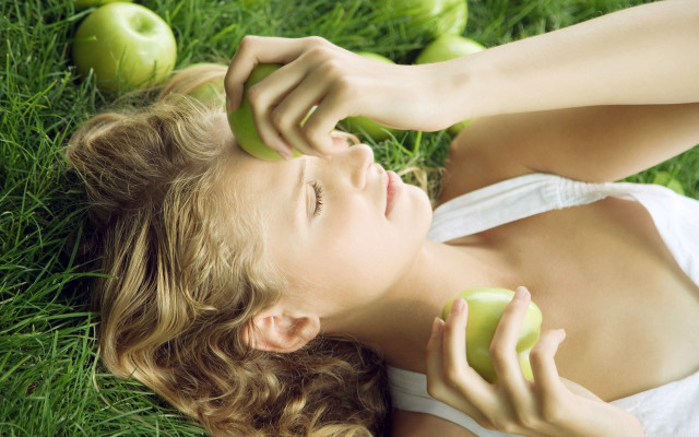 Woman lying grass apples night free wallpaper - medium preview image