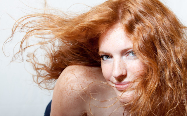 Red haired woman blowing wind #2 free wallpaper for desktop - medium preview image