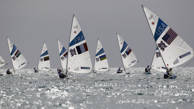 Sailboats ocean sunny grey sky free wallpaper - medium preview image