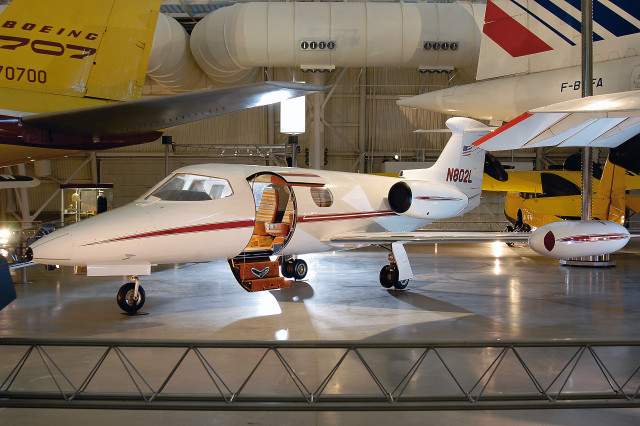 Small airplane museum display man free wallpaper - medium preview image