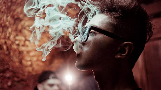 Woman glasses smoke light wall free wallpaper - medium preview image
