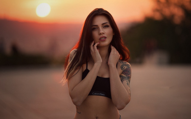 Tattooed woman sunset beach cinematic free wallpaper - medium preview image