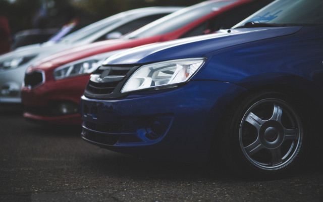 Parked cars parking lot person free wallpaper - medium preview image
