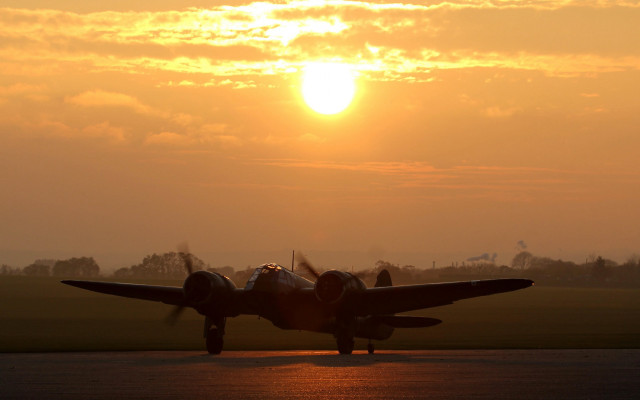 Plane takeoff sunset clouds backlit free wallpaper - medium preview image