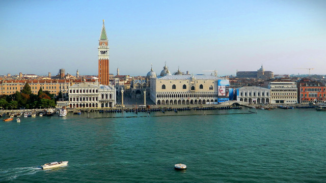 Panoramic cityscape boat shore water free wallpaper - medium preview image