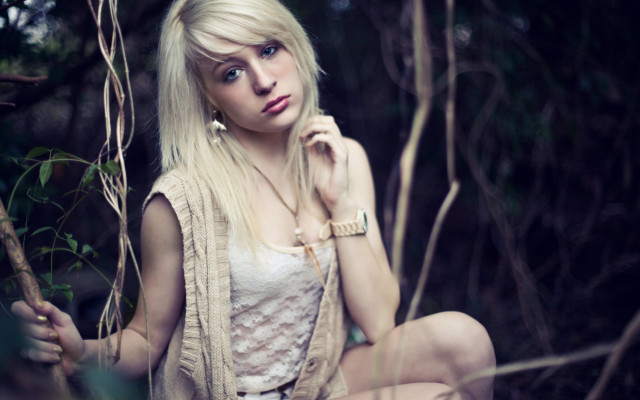 Woman branch forest blonde serious free wallpaper - medium preview image