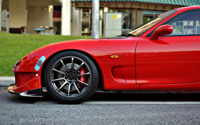 Red sports car parked building #3 free wallpaper - medium preview image