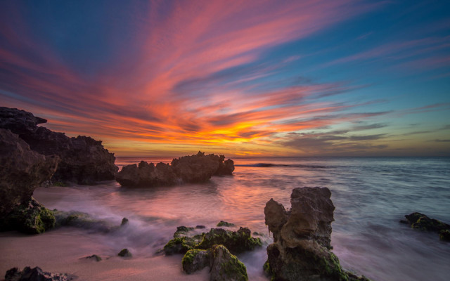Sunset ocean rocks water clouds free wallpaper - medium preview image