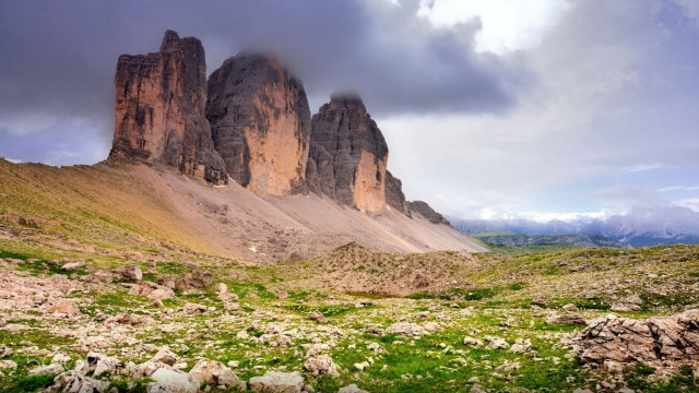 Mountain range rocks grass cloudy free wallpaper - medium preview image
