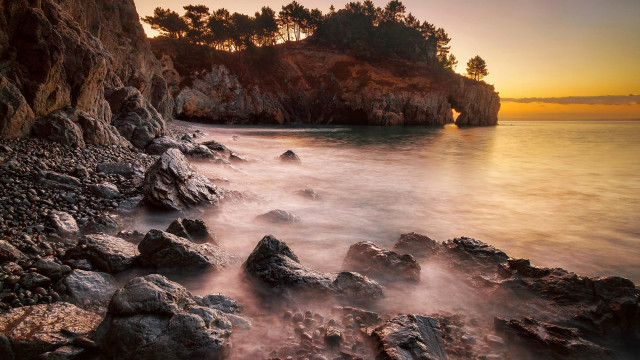 Rocky beach small island sunset free wallpaper - medium preview image