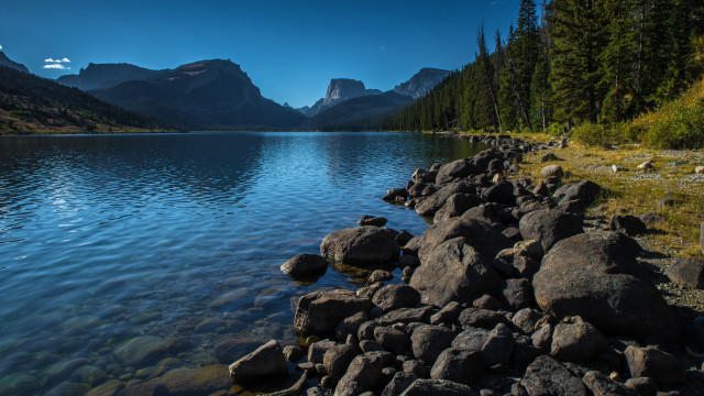 Lake mountains trees rocks blue free wallpaper - medium preview image