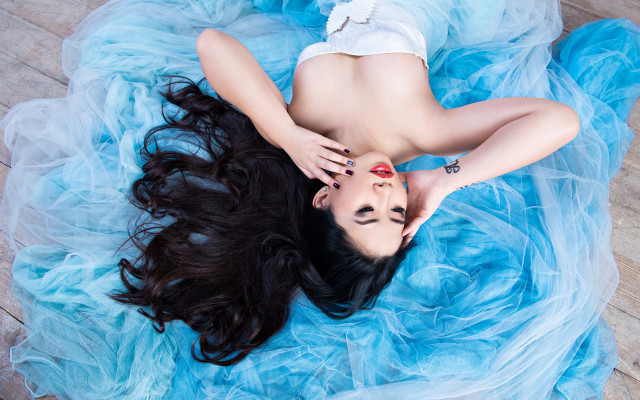 Woman blue dress relaxing black free wallpaper - medium preview image