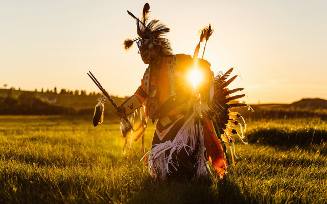Costumed person field sunset fire free wallpaper - medium preview image