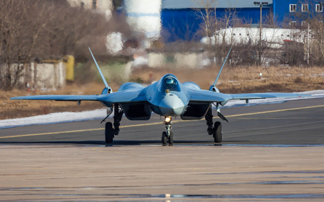 Fighterjet runway building blue sky free wallpaper - medium preview image
