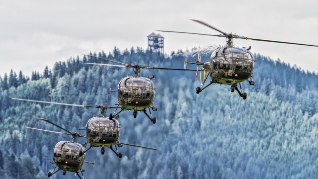 Helicopters forest hills tower mountains free wallpaper - medium preview image