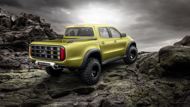 Yellow truck rocky terrain cloudy free wallpaper - medium preview image