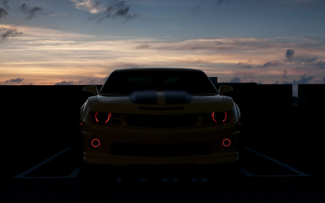 Yellow car dusk parking lot free wallpaper - medium preview image
