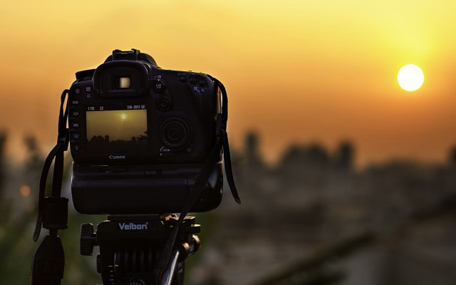 Sunset cityscape silhouette anamorphic flare free wallpaper - medium preview image
