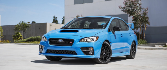 Blue subaru parking lot building free wallpaper - medium preview image