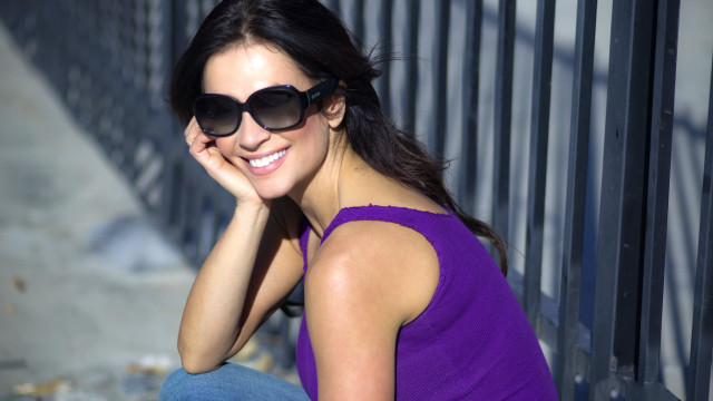 Woman sunglasses fence purple shirt free wallpaper - medium preview image