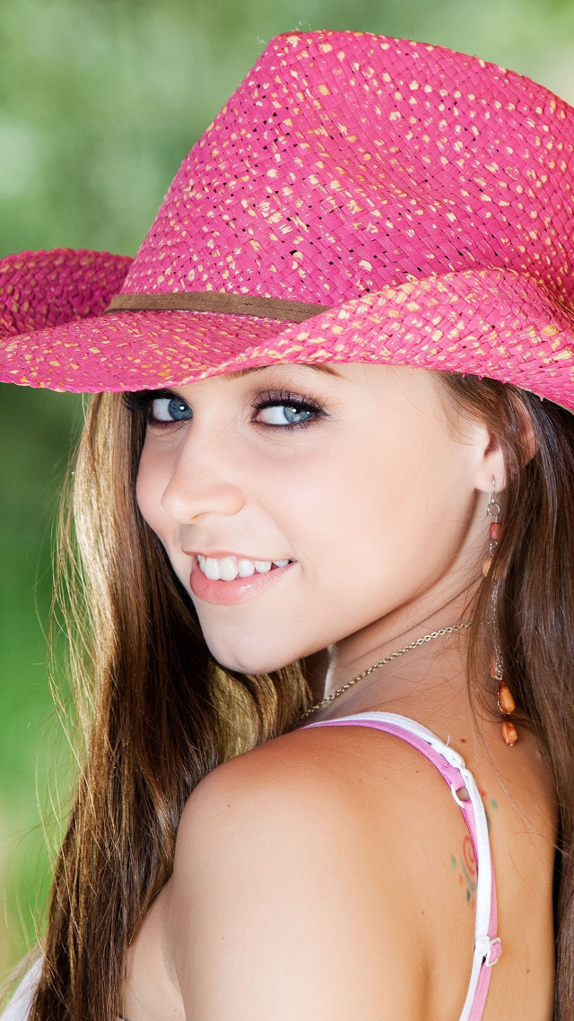 Girl pink hat smiling green free wallpaper - medium preview image