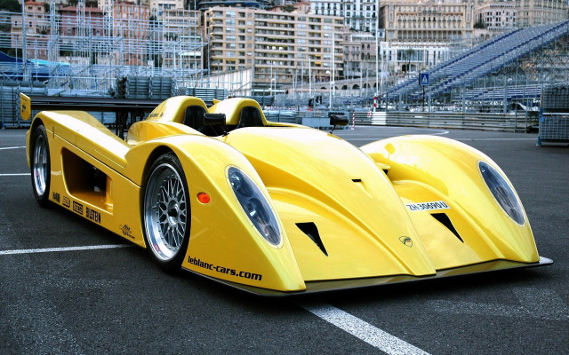 Yellow racecar cityscape night moon free wallpaper - medium preview image