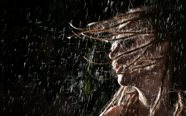 Woman dreadlocks rain wind cityscape free wallpaper - medium preview image