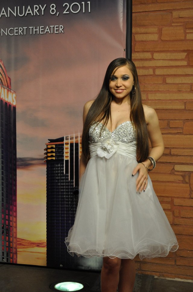 Woman white dress cityscape poster free wallpaper - medium preview image