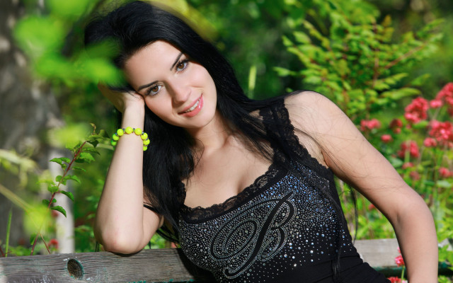 Woman black dress garden portrait #2 free wallpaper - medium preview image