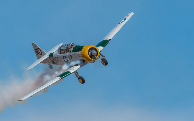 Small airplane blue sky smoke free wallpaper - medium preview image