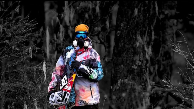 Colorful jacket man skiing forest free wallpaper - medium preview image