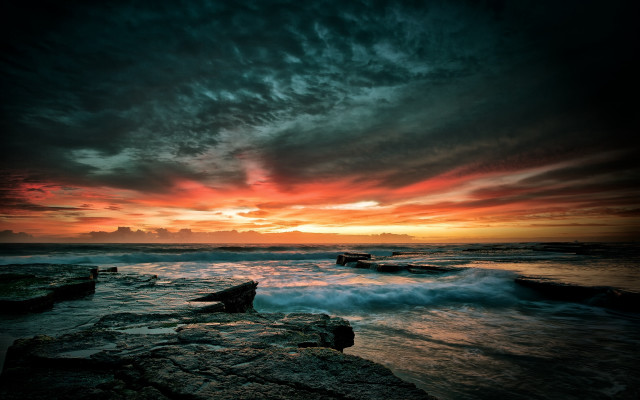 Sunset ocean boat rocks cloudy free wallpaper - medium preview image
