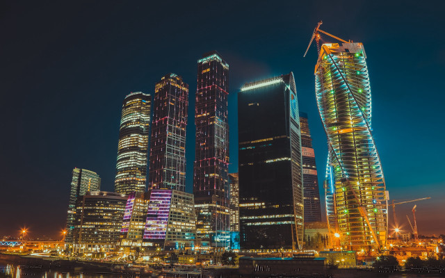 Cyberpunk cityscape tower river bridge free wallpaper - medium preview image