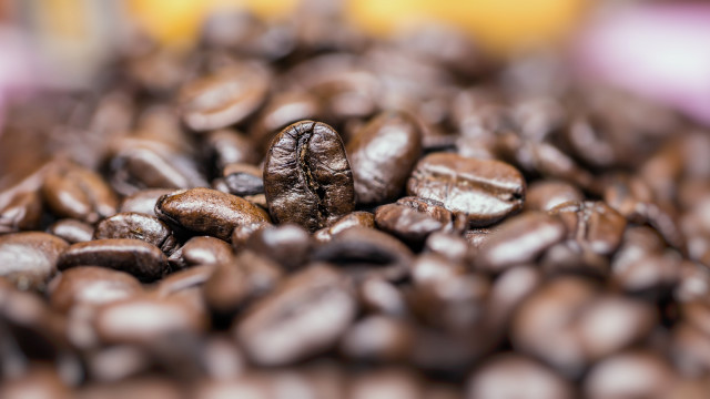 Coffee beans hyperrealism blurry background free wallpaper - medium preview image