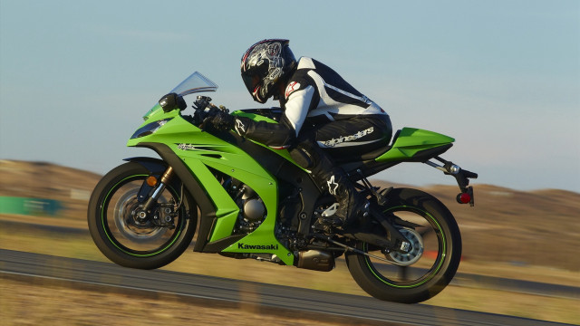 Motorcycle rider green road field free wallpaper - medium preview image